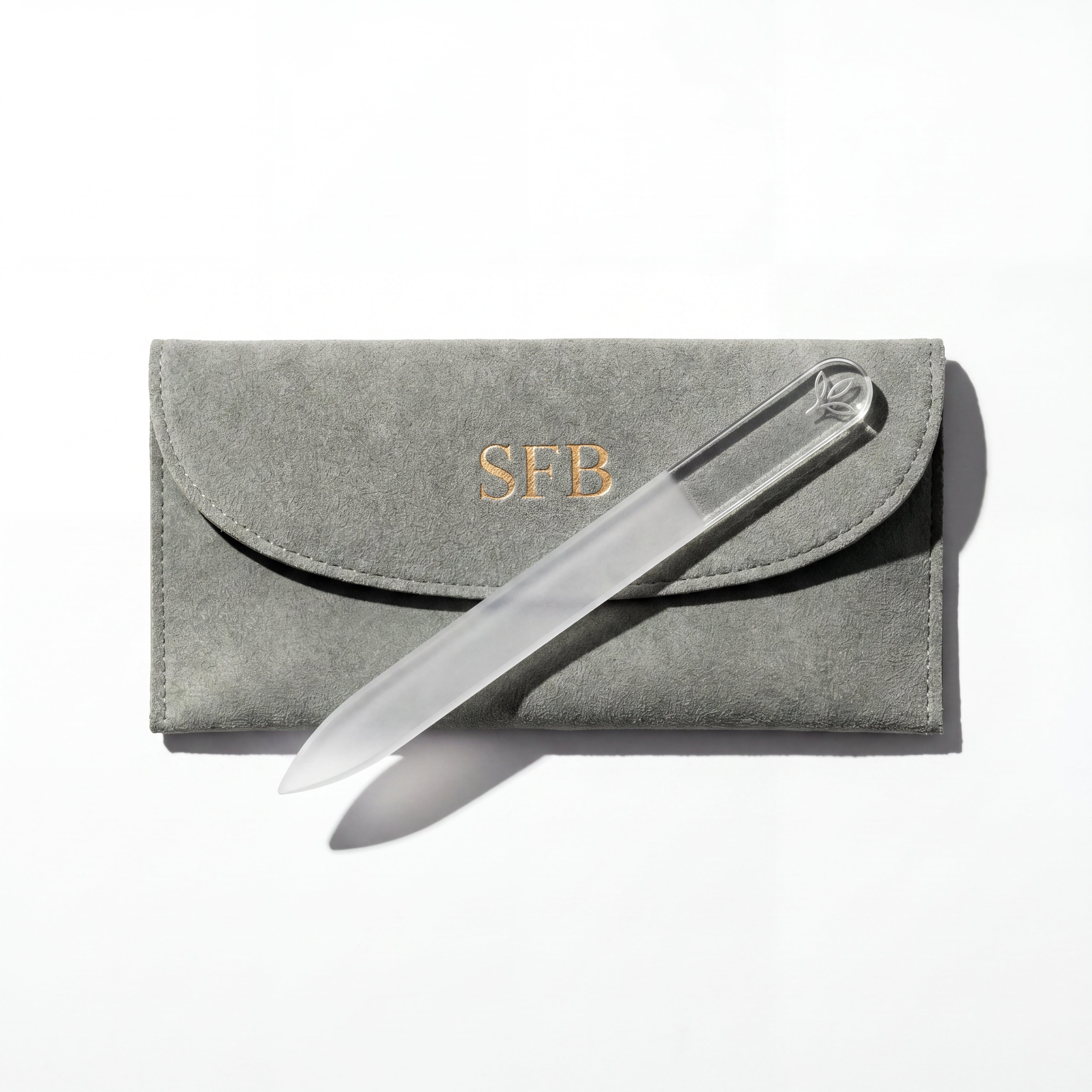 Sandblasted Santa Fe Botanicals monogram detail on the sage finish of The Crystal File